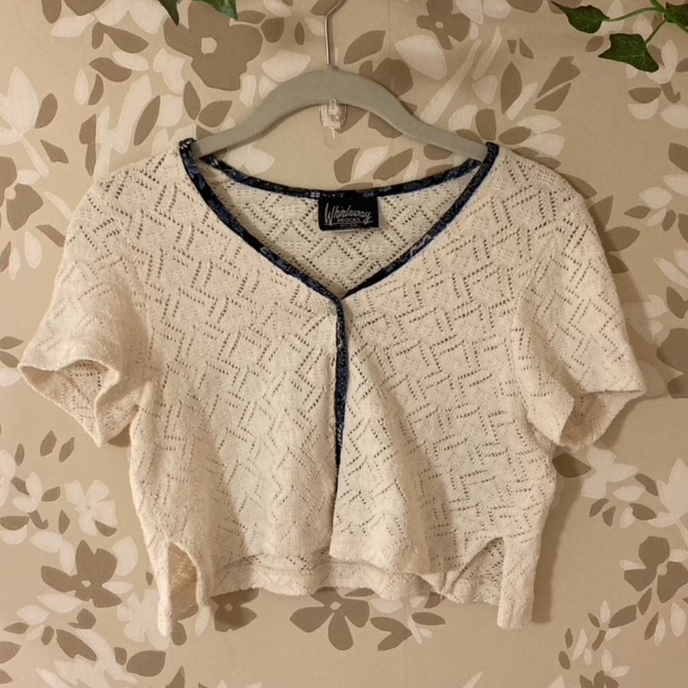 white knit cropped button up crop top. very small stain on the back,
